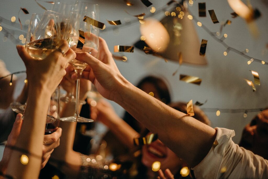 People Toasting Wine Glasses during christmas in goa